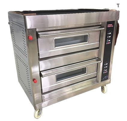 El pan redondo de coco se hace fácil con la máquina de horno de cubierta grande en la panadería Pie Long Loaf